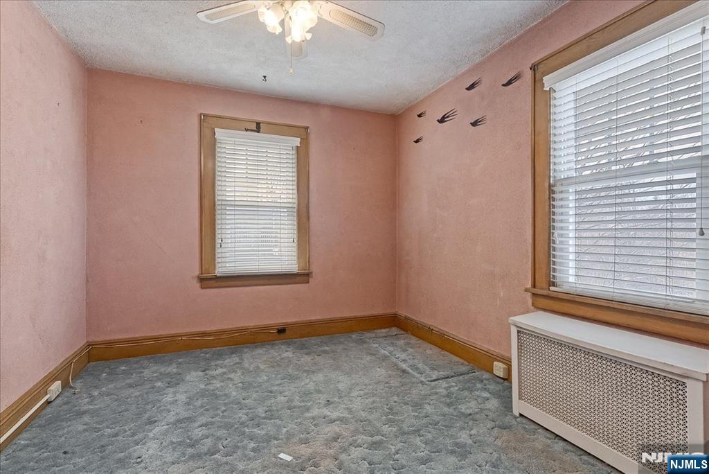52 Manner Avenue Garfield, NJ 07026 - Photo 17 of 23 a view of an empty room with a window