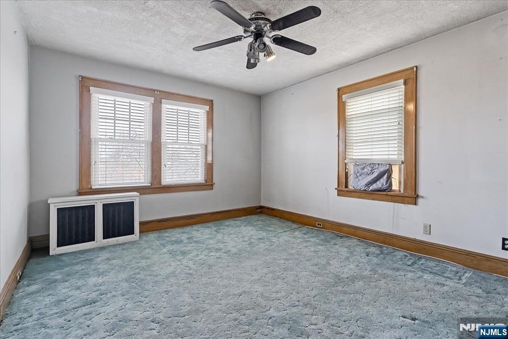 52 Manner Avenue Garfield, NJ 07026 - Photo 18 of 23 a view of an empty room with a window