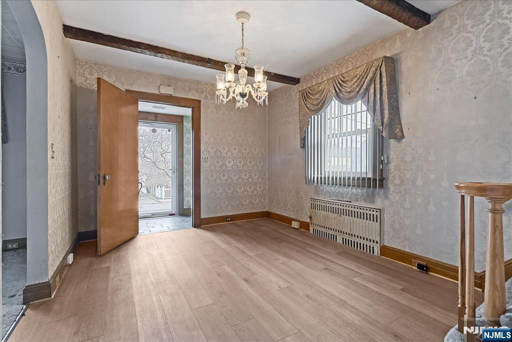 52 Manner Avenue Garfield, NJ 07026 - Photo 2 of 23 wooden floor and windows in an empty room