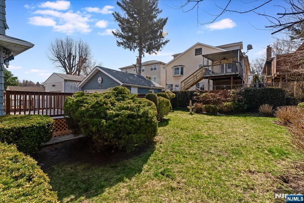 52 Manner Avenue Garfield, NJ 07026 - Photo 22 of 23 a front view of a house with a yard