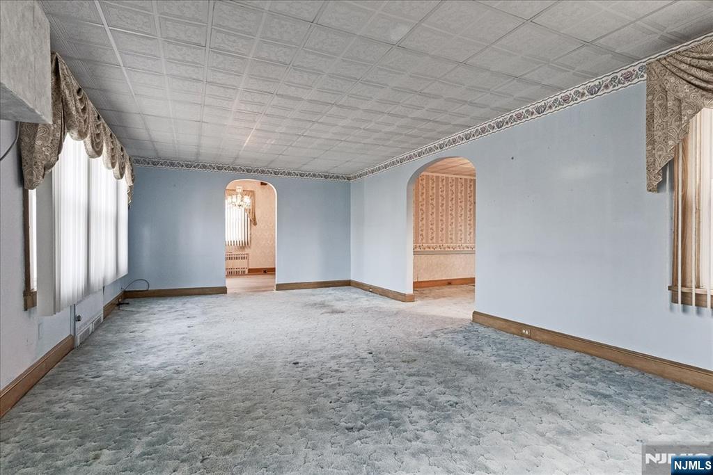 52 Manner Avenue Garfield, NJ 07026 - Photo 5 of 23 a view of an empty room with a window