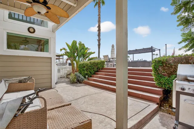 a view of a balcony with chairs