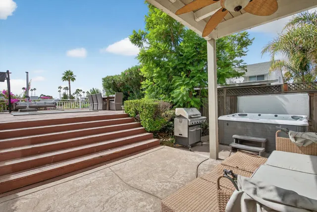 a view of a chairs and tables in the patio