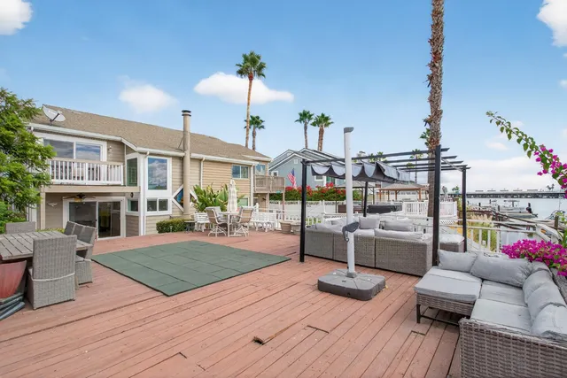 a view of living room and patio kitchen