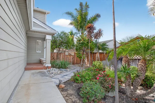 a view of a back yard of the house