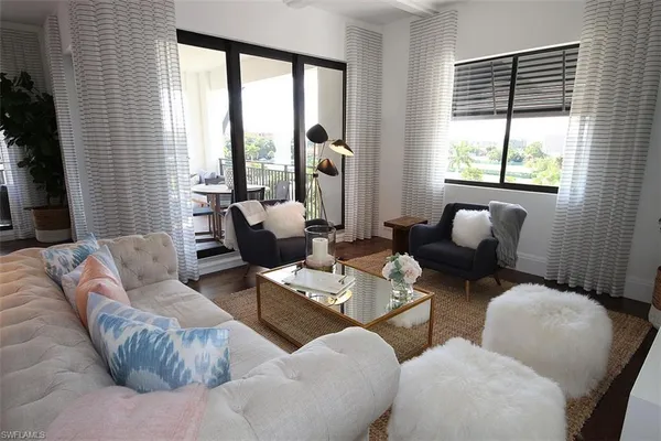 a living room with furniture and floor