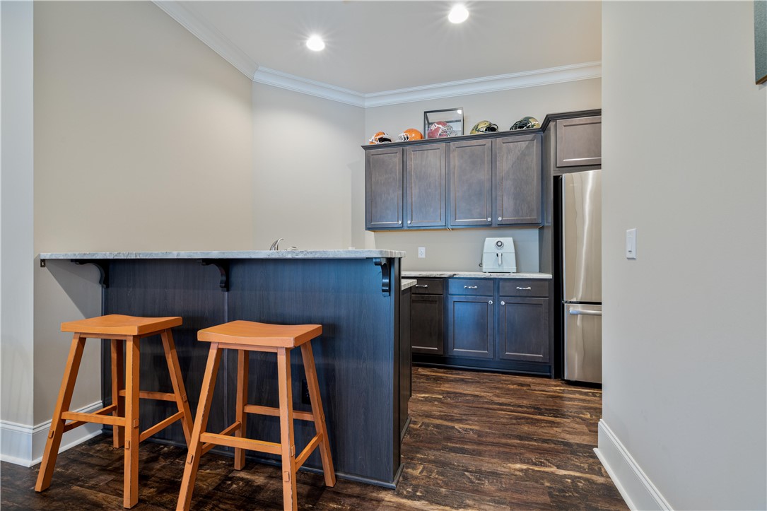 301 Stonebridge Drive Clemson, SC 29631 - Photo 39 of 47 This versatile area features a convenient wet bar, perfect for entertaining guests.