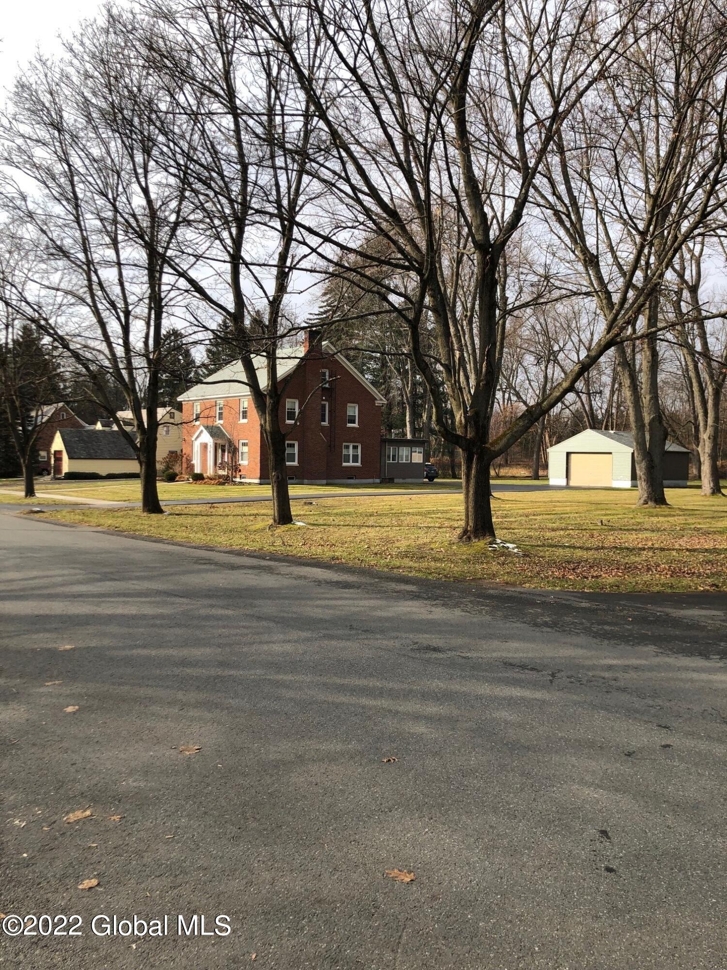 28 Tudor Road Albany, NY 12203 - Photo 3 of 49 side of house with additional lot