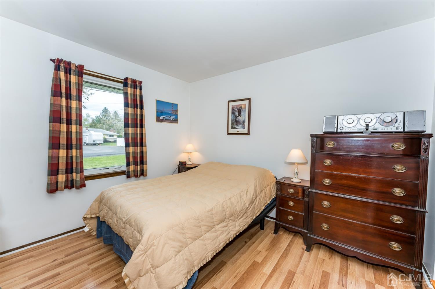 88 Stratton Street South Piscataway, NJ 08854 - Photo 15 of 22 a bedroom with a bed and a window