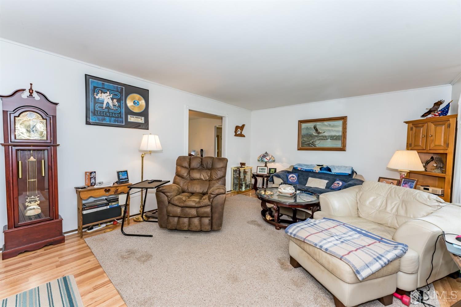 88 Stratton Street South Piscataway, NJ 08854 - Photo 3 of 22 a living room with furniture and a lamp