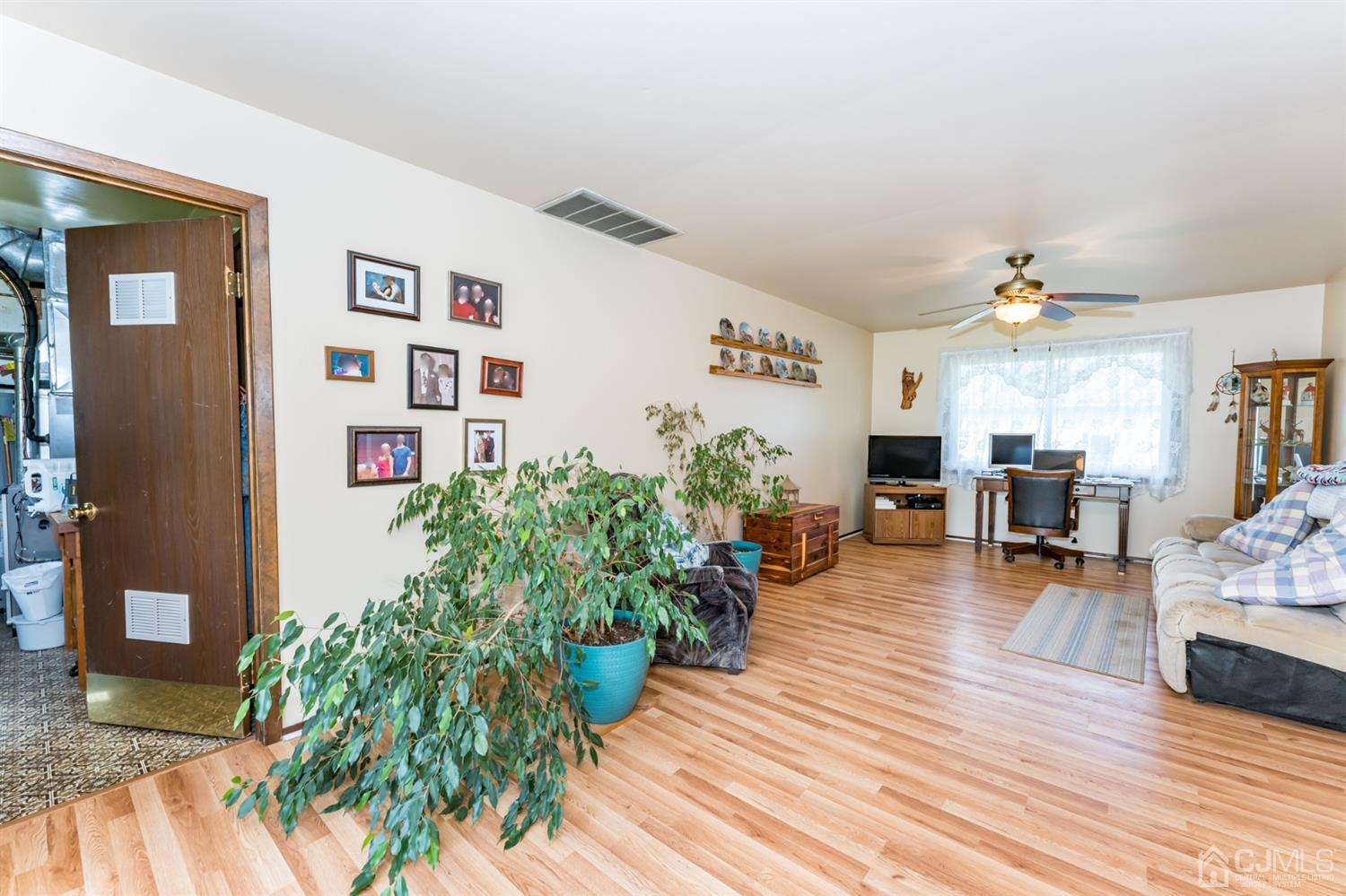 88 Stratton Street South Piscataway, NJ 08854 - Photo 10 of 22 a living room with furniture and wooden floor