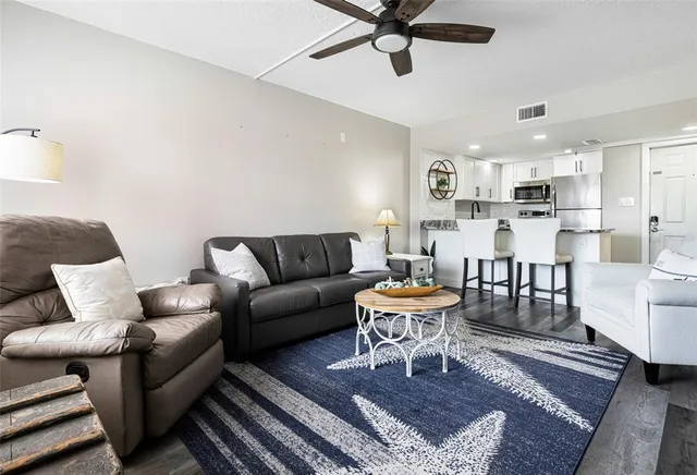 a living room with a couch and a coffee table
