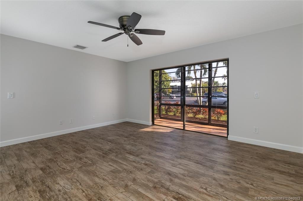 800 Northwest Fork Road, Unit 86 Stuart, FL 34994 - Photo 13 of 40 a view of an empty room with a window