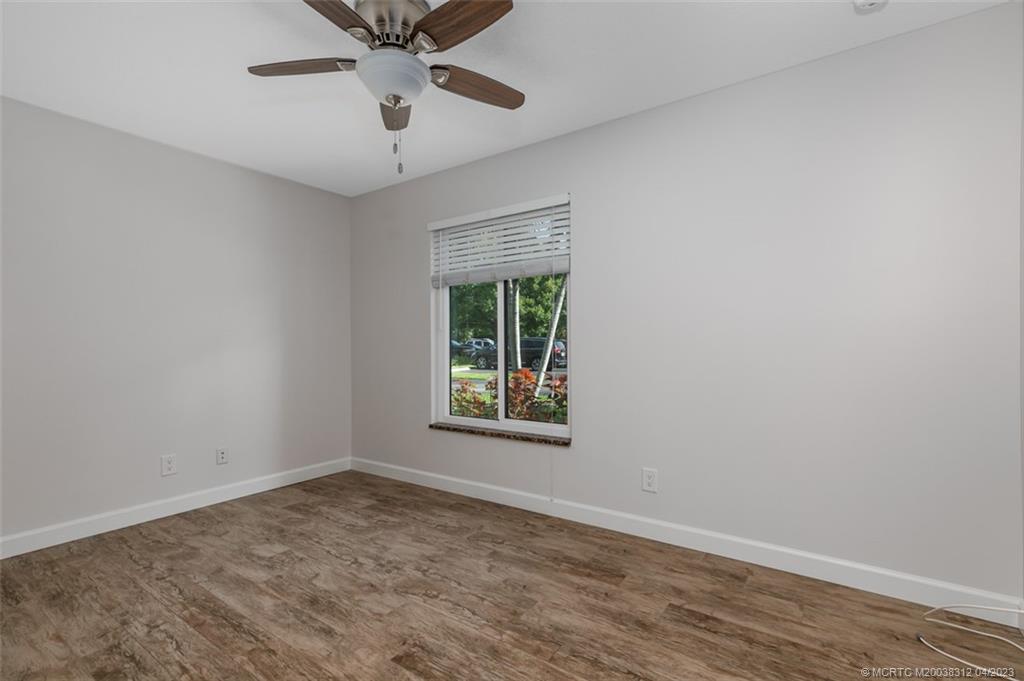800 Northwest Fork Road, Unit 86 Stuart, FL 34994 - Photo 16 of 40 a view of an empty room with a window