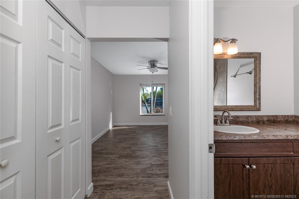 800 Northwest Fork Road, Unit 86 Stuart, FL 34994 - Photo 20 of 40 a bathroom with a sink and a mirror