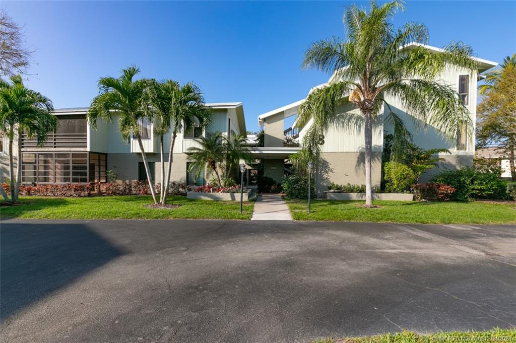 800 Northwest Fork Road, Unit 86 Stuart, FL 34994 - Photo 39 of 40 a view of road and trees