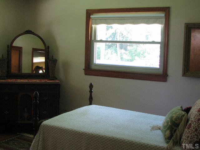 611 Crosby Road Durham, NC 27704 - Photo 13 of 25 Master Bedroom w/remodeled 1/2 Bath. Nice sized closet with light. Bedroom is located at back of house and has both a side and a back window.