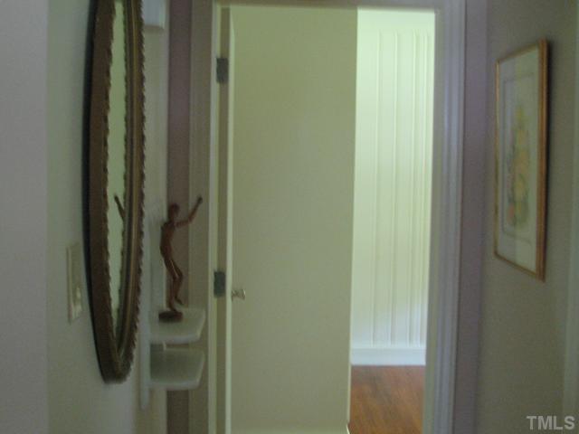 611 Crosby Road Durham, NC 27704 - Photo 19 of 25 Hall view with old telephone niche. Pull down attic located in hall.
