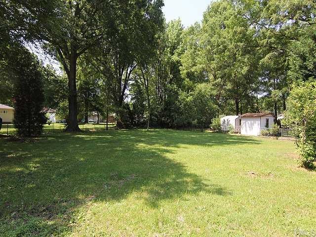 611 Crosby Road Durham, NC 27704 - Photo 24 of 25 Deep Back Yard is mostly fenced. Nice area perfect for gardening or playset.