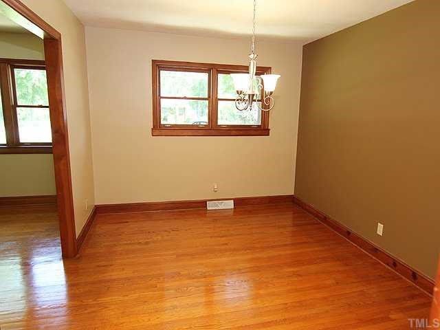 611 Crosby Road Durham, NC 27704 - Photo 6 of 25 Fresh Paint w/Contrast wall make this Dining Room perfect for large table and china cabinet or sideboard. Previous Dining Room furniture also included 2 corner cabinets which fit perfectly. See next photo w/furnishings.