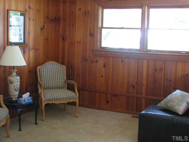 611 Crosby Road Durham, NC 27704 - Photo 10 of 25 Spacious Den is light and bright with multiple large windows.