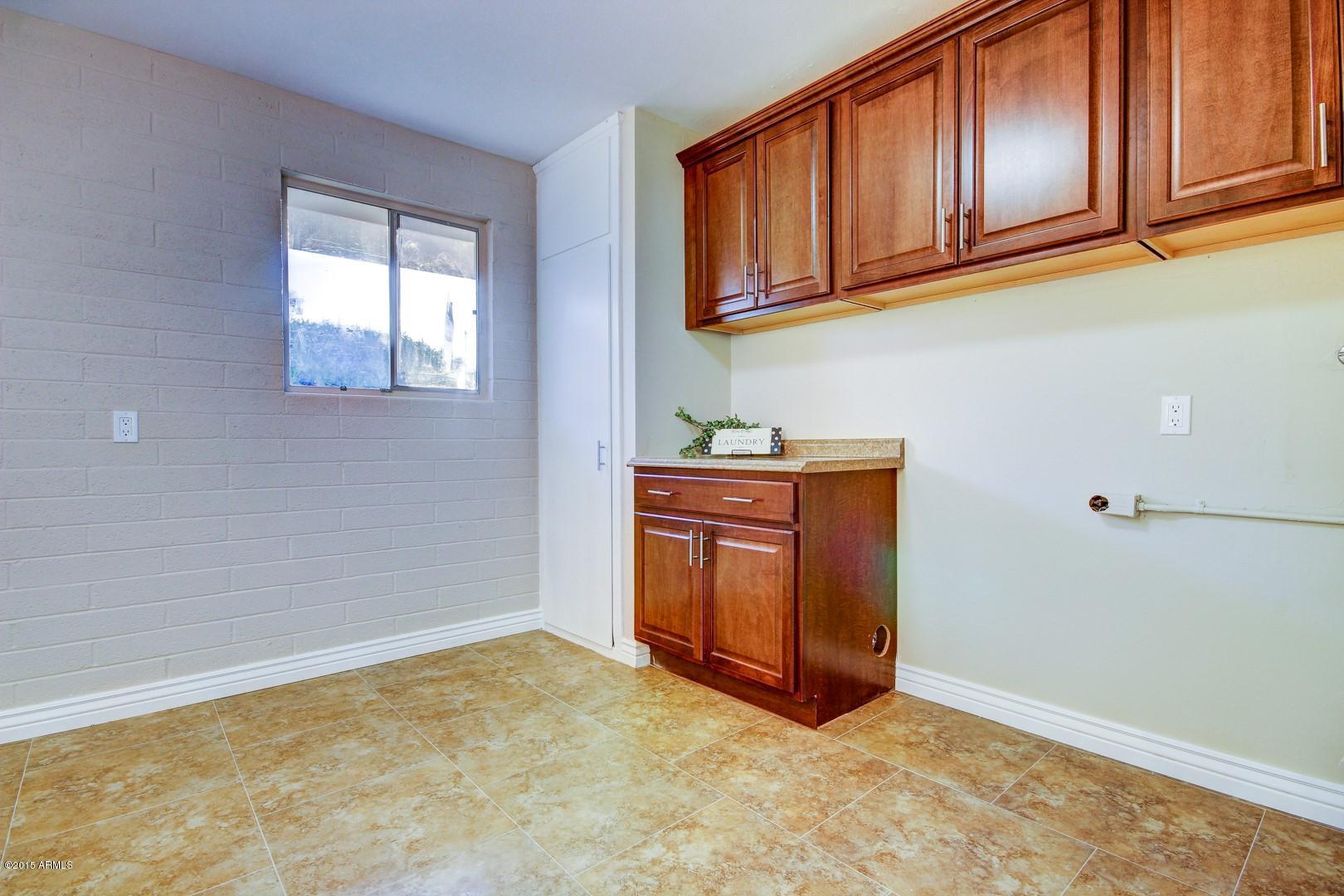 10226 West Mountain View Road Sun City, AZ 85351 - Photo 41 of 58 Laundry/Hobby Room