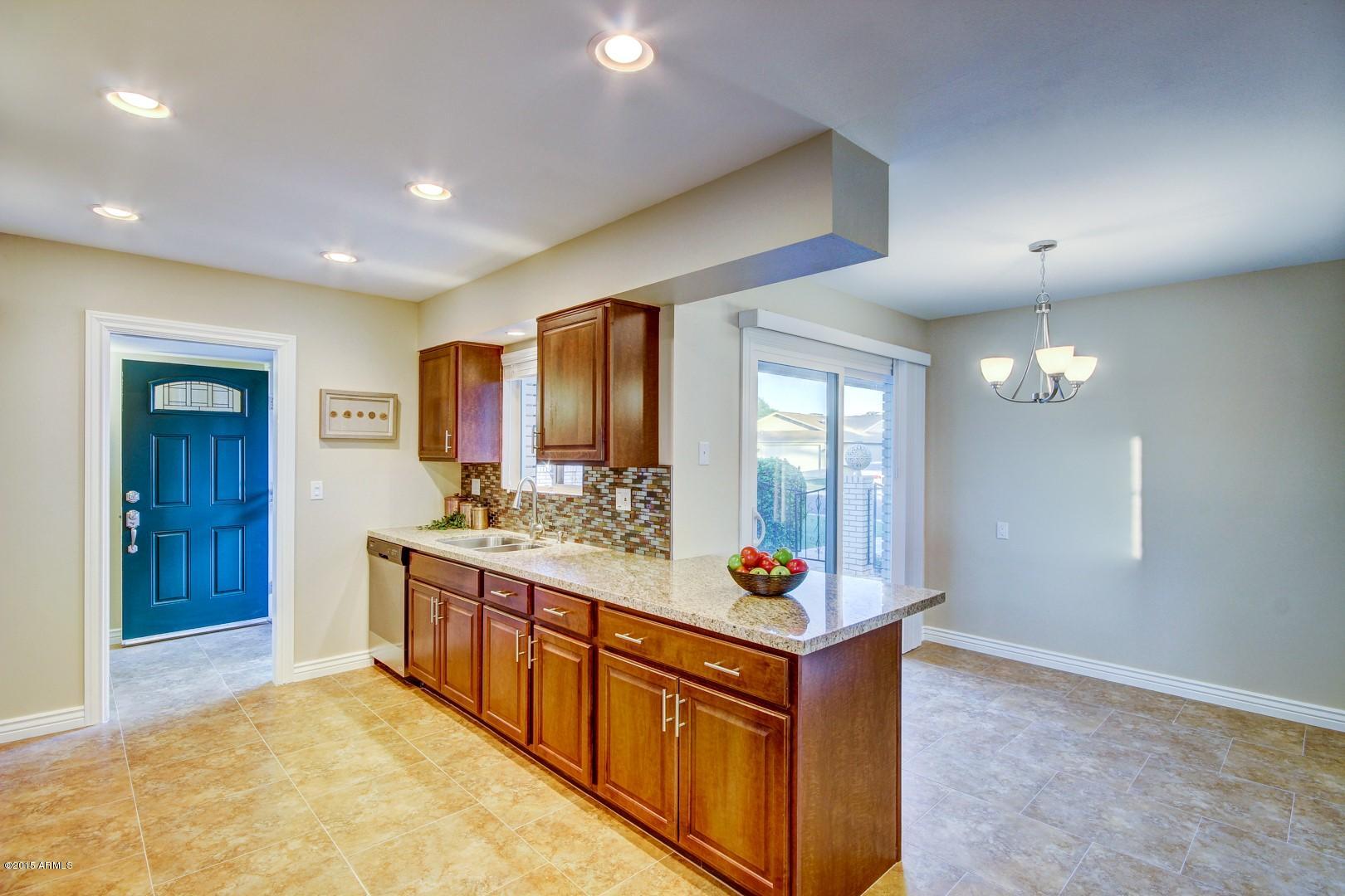 10226 West Mountain View Road Sun City, AZ 85351 - Photo 5 of 58 View from kitchen into Breakfast room