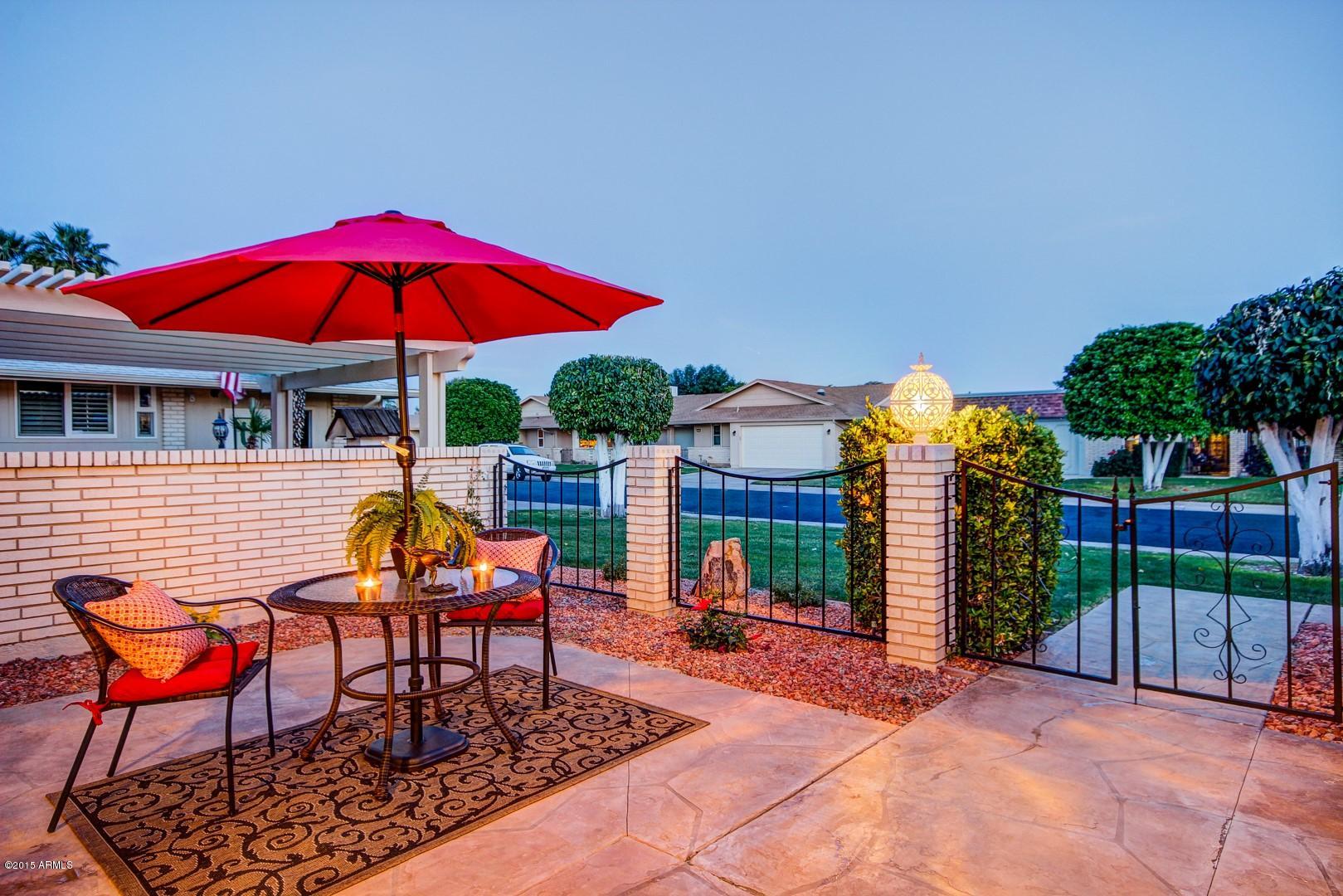 10226 West Mountain View Road Sun City, AZ 85351 - Photo 51 of 58 Courtyard at dusk