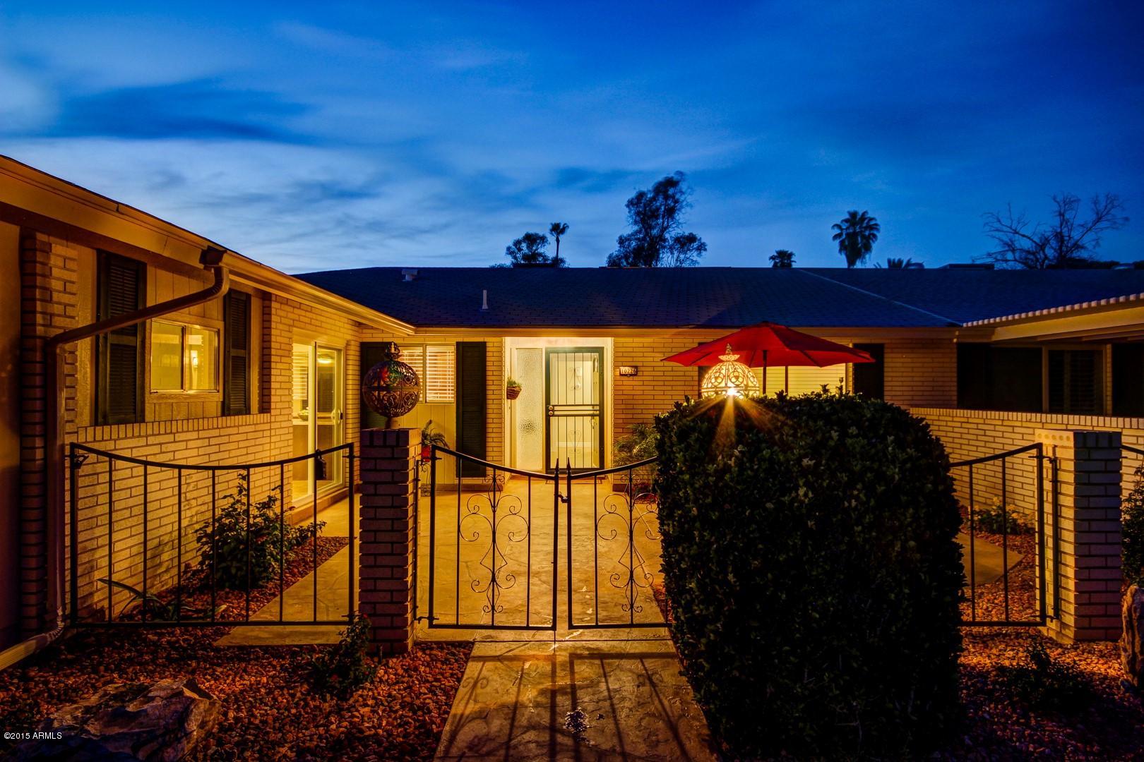10226 West Mountain View Road Sun City, AZ 85351 - Photo 54 of 58 Courtyard at night