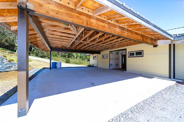 a house view with a backyard space