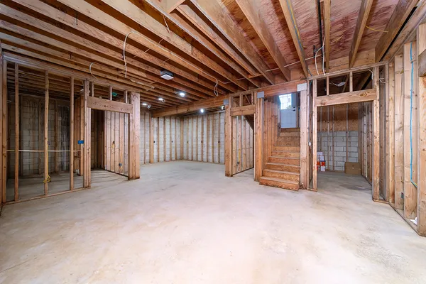 a view of empty room with staircase