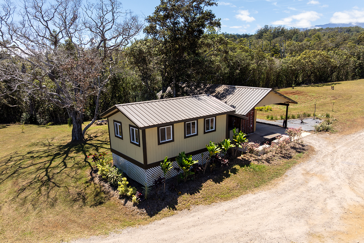 44-2221 Paauilo Mauka Road Paauilo, HI 96776 - Photo 20 of 30 a view of a house with a yard covered with snow in the background
