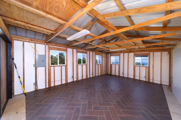 a view of room with wooden floor