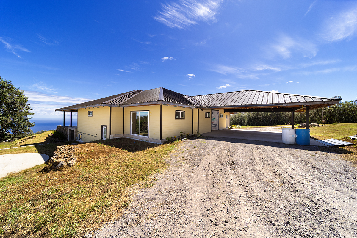 44-2221 Paauilo Mauka Road Paauilo, HI 96776 - Photo 5 of 30 a large house with swimming pool in front of it
