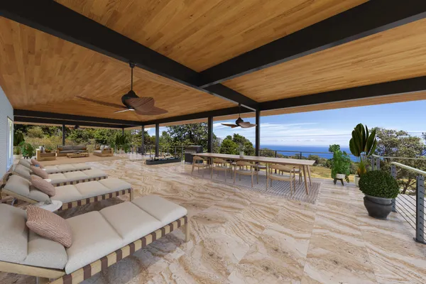 a view of a patio with a table and chairs under an umbrella
