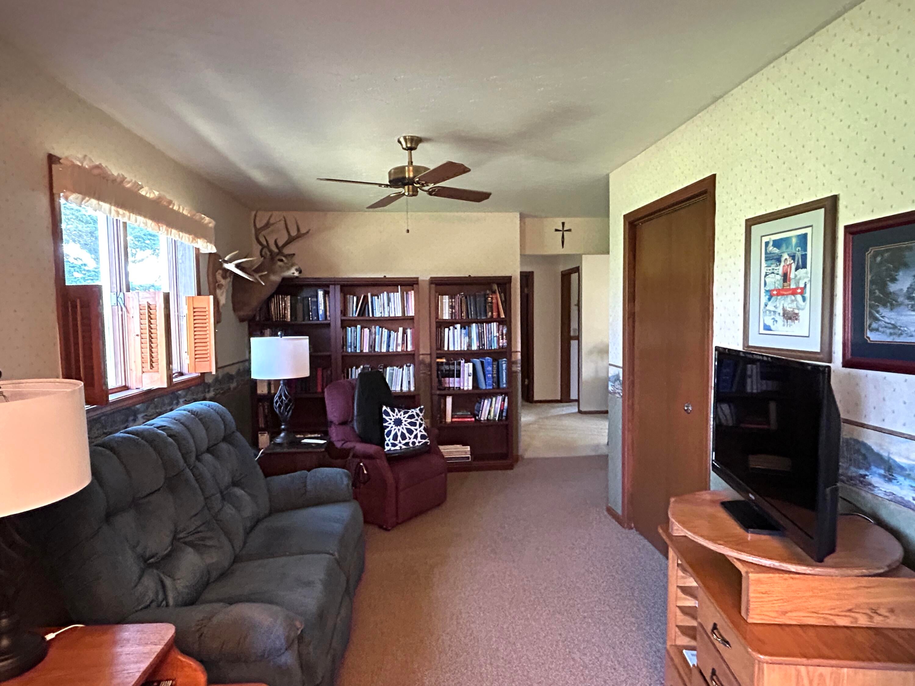 9634 Indian Reserve Road Alpena, MI 49707 - Photo 11 of 38 Family Room