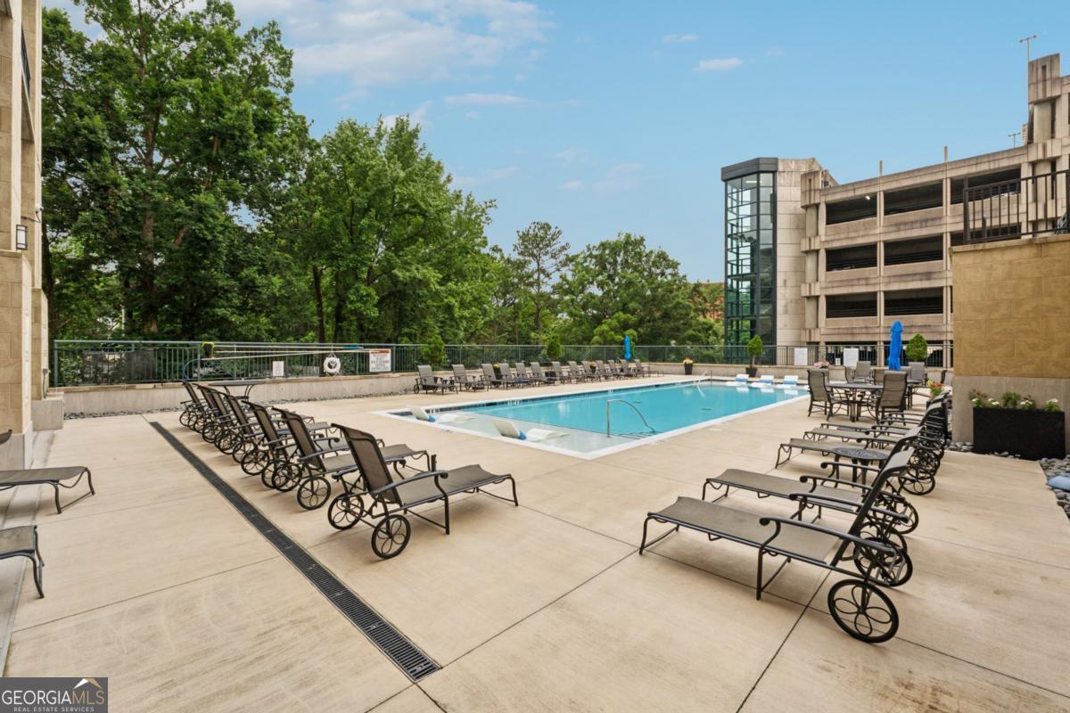 3040 Peachtree Road Northwest, Unit 702 Atlanta, GA 30305 - Photo 5 of 26 an outdoor view with patio