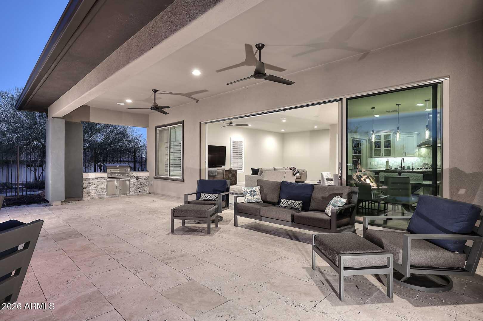 17916 East Cindercone Road Rio Verde, AZ 85263 - Photo 26 of 80 a living room with furniture and a large window
