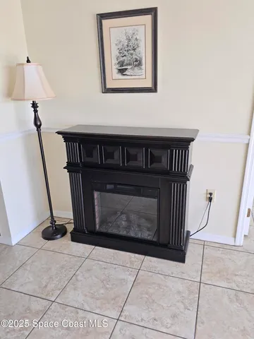 a view of an entryway with a fireplace