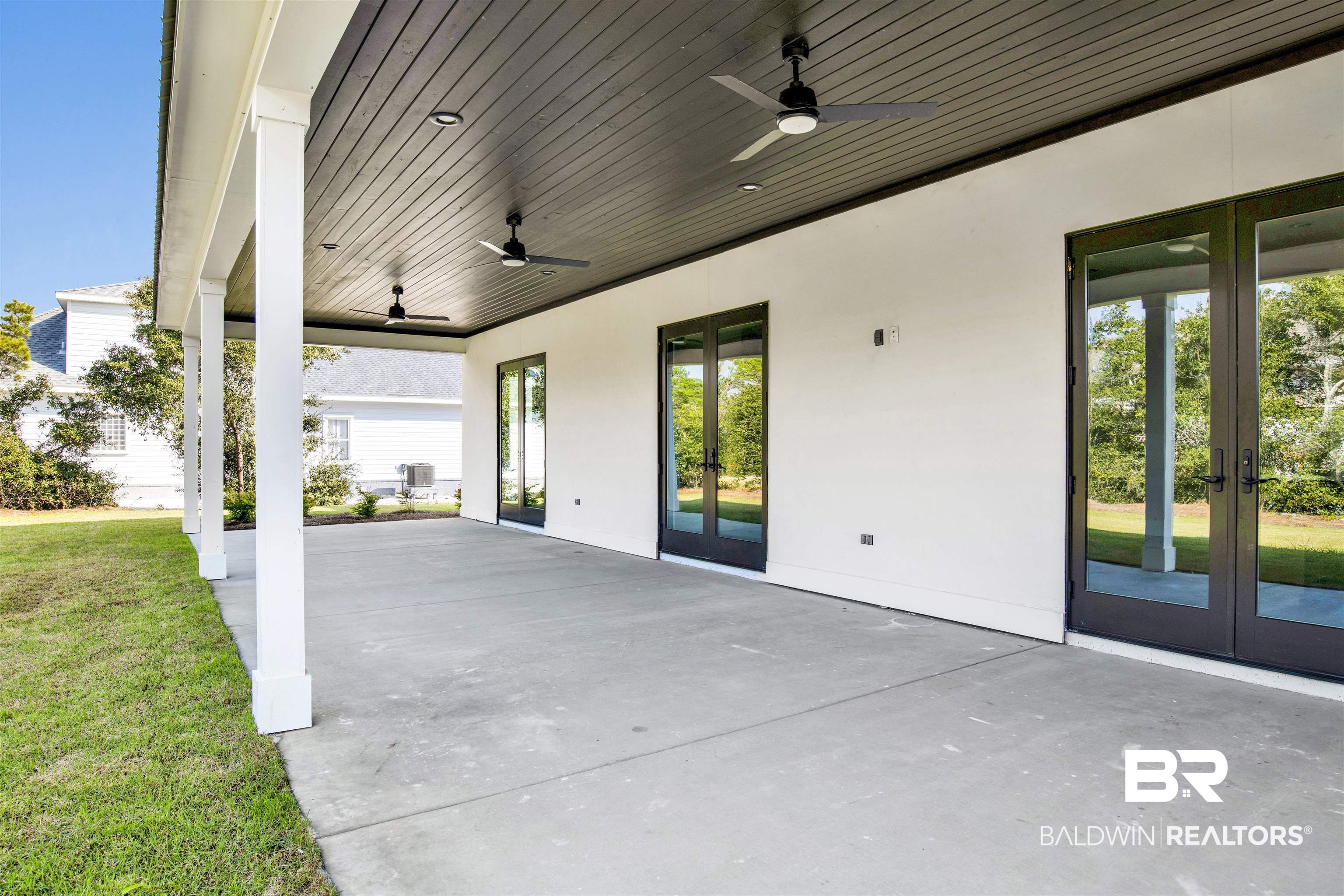 31545 River Road Orange Beach, AL 36561 - Photo 44 of 59 View of patio / terrace featuring French doors and ceiling fan
