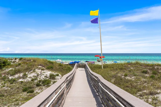 a view of a balcony with an ocean