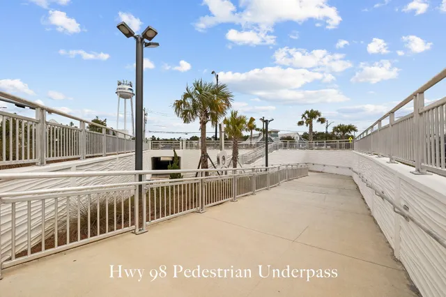 a view of a balcony with yard