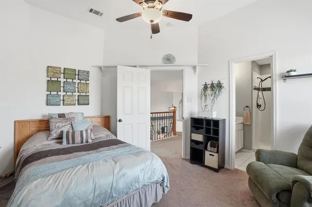 a bedroom with a bed and furniture