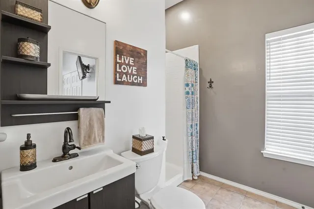 a bathroom with a sink and a toilet