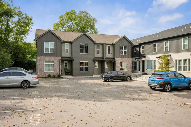 a view of street with parked cars