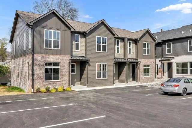 a view of a car parked in front of a building