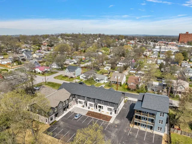 an aerial view of a house with a garden