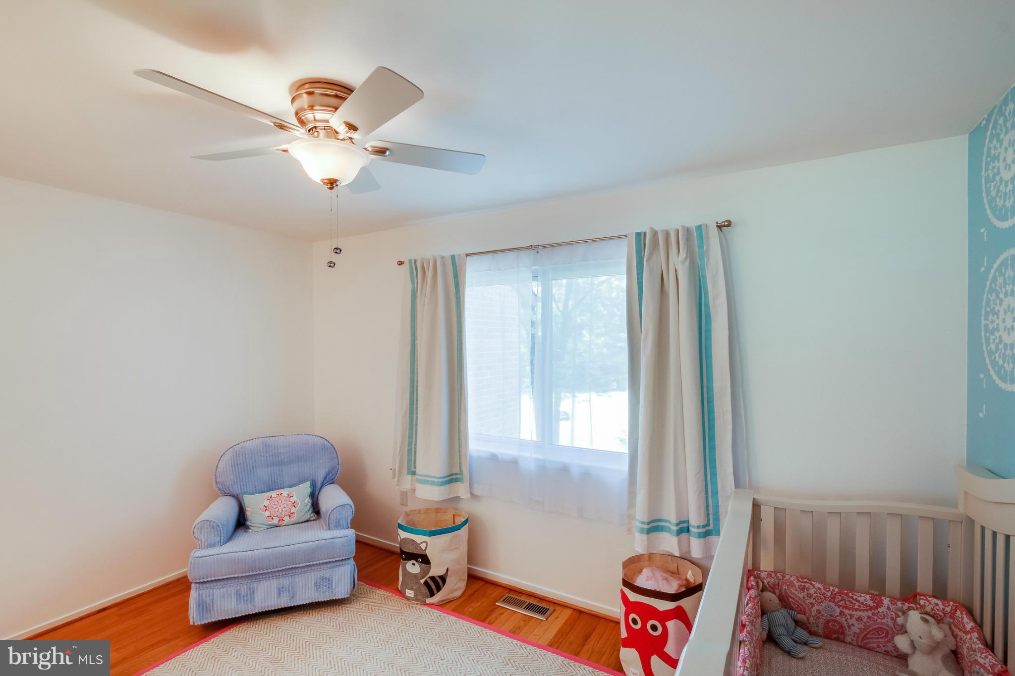 11729 Indian Ridge Road Reston, VA 20191 - Photo 26 of 30 a room with furniture and a window
