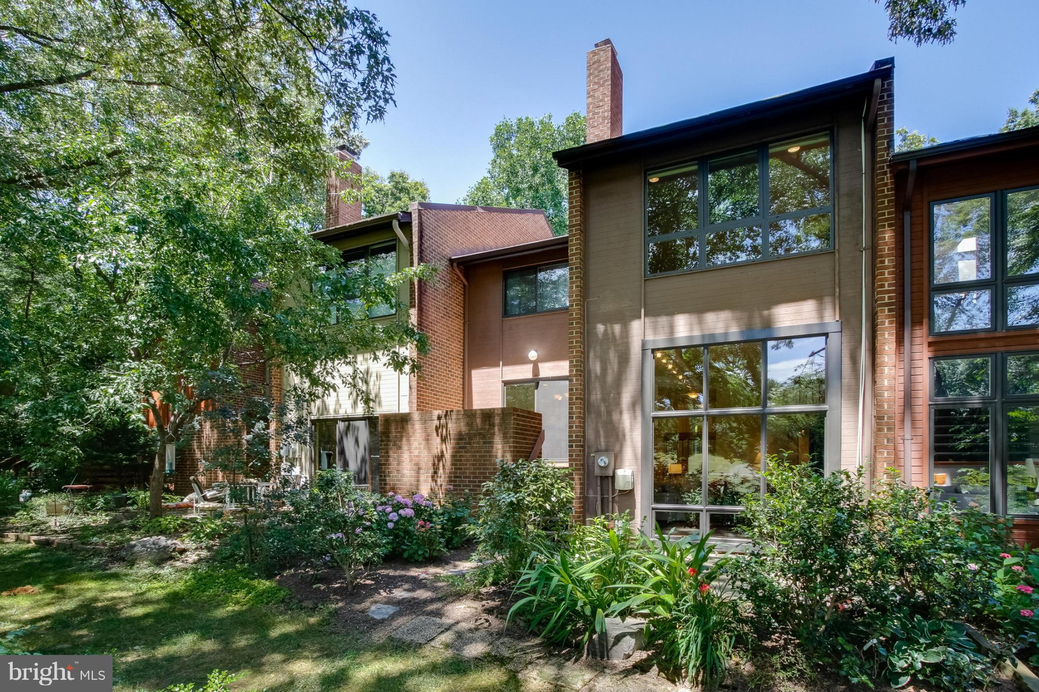 11729 Indian Ridge Road Reston, VA 20191 - Photo 27 of 30 a front view of a house with a yard