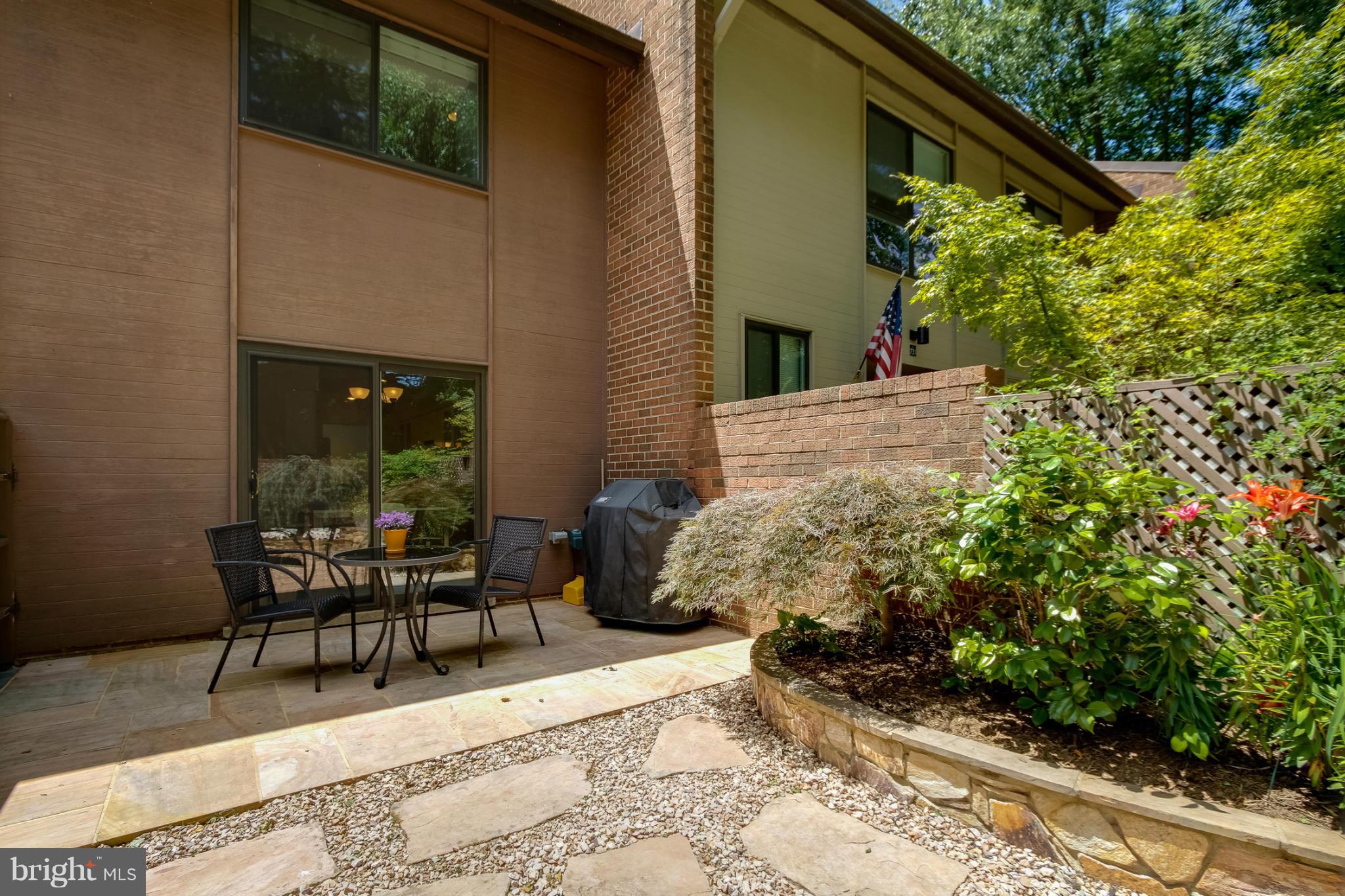 11729 Indian Ridge Road Reston, VA 20191 - Photo 4 of 30 a view of backyard with outdoor seating and plants